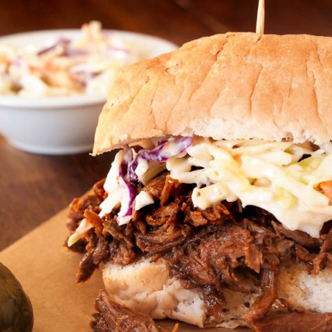 Throw a few ingredients into your slow cooker in the morning, and by dinner you're going to be greeted by the amazing aroma of these Slow Cooker BBQ Beef Sandwiches. This saucy, seasoned shredded beef is great on a bun with a vinegary coleslaw or Swiss cheese.