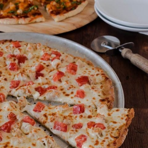 Improve your pizza night by adding this Gourmet Chicken Pizza to the rotation. It uses prepared salad dressing for the sauce, so it's perfect for those that don't like the standard tomato pizza sauce.