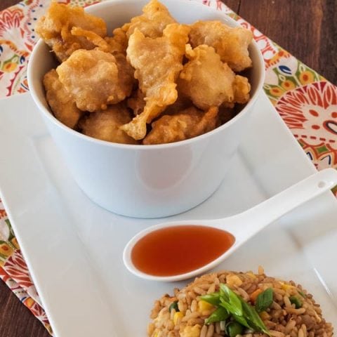 Forget the restaurants - make your own Chinese food at home with these gluten free Chinese Chicken Balls with Sweet and Sour Sauce. A thin, crispy shell wrapped around tender chicken. And don't forget about that magical Sweet & Sour Sauce. Yum!