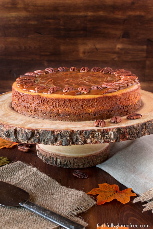 Indulge in this gluten free Pumpkin Cheesecake, with it's velvety texture, warming spices, and nutty crust, everyone is sure to ask for another slice.