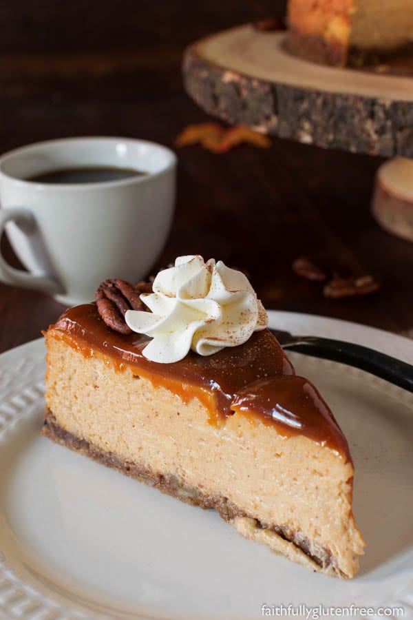 Indulge in this gluten free Pumpkin Cheesecake, with it's velvety texture, warming spices, and nutty crust, everyone is sure to ask for another slice.