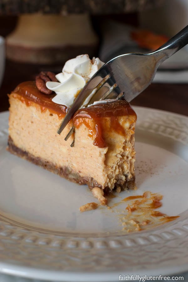 Indulge in this gluten free Pumpkin Cheesecake, with it's velvety texture, warming spices, and nutty crust, everyone is sure to ask for another slice.