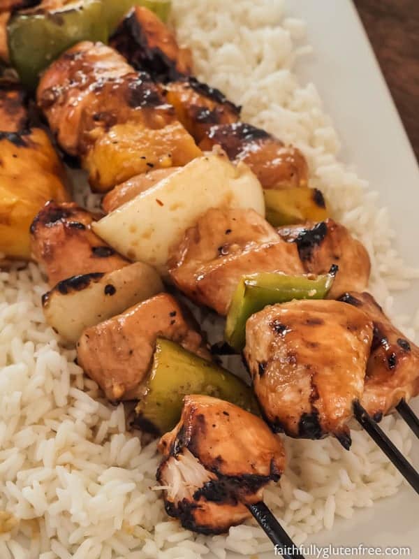 These Yummy Honey Chicken Kabobs are made up of chicken, pepper, onion, and pineapple that are skewered and then smothered with a honey-based glaze.