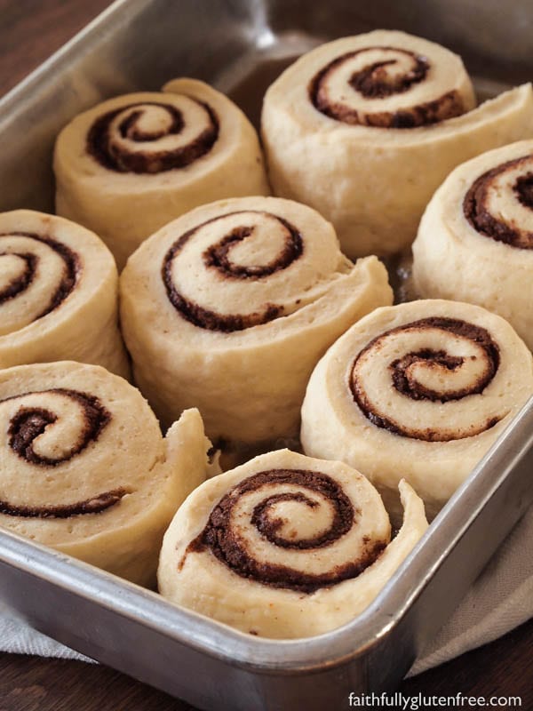 A pan of unbaked gluten free cinnamon rolls