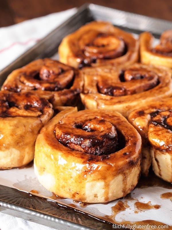 a tray of ooey gooey gluten free cinnamon buns.