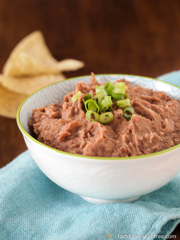 No Mexican meal is complete without a side of these healthy Refried Beans. Learn how easy it is to make your own delicious Refried Beans at home, better than anything you can get in a can, that's for sure!