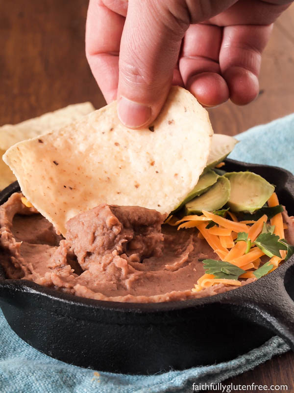 No Mexican meal is complete without a side of these healthy Refried Beans. Learn how easy it is to make your own delicious Refried Beans at home, better than anything you can get in a can, that's for sure!