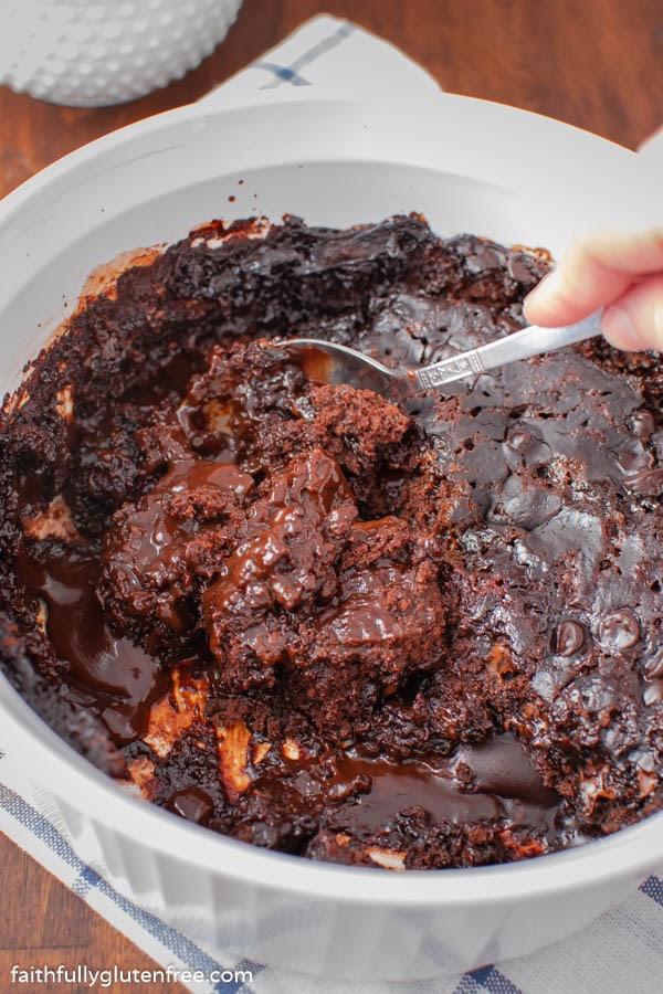 a baking dish with chocolate pudding cake