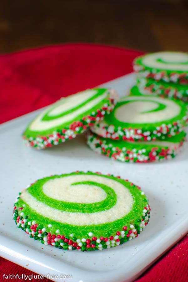 A plate with white and green swirled cookies