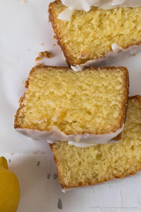 This Gluten Free Lemon Pound Cake, drizzled with a tart lemony glaze, is the perfect dessert, afternoon snack, or little "something special" in your kid's lunch kit.