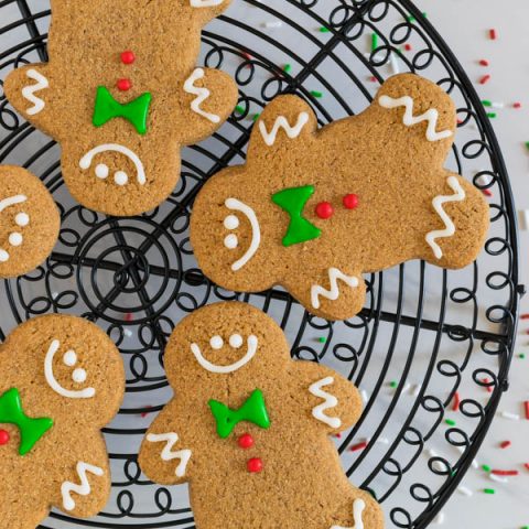 The spicy aroma of soft, chewy Gluten Free Gingerbread Men Cookies will make your mouth water. I dare you to not nibble on one while you're decorating them.