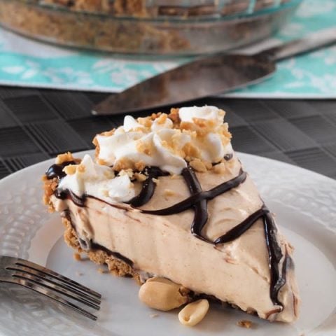A tall glass of milk or a strong cup of coffee is all that you need to accompany this easy no bake Peanut Butter Pie with Chocolate Covered Pretzel Crust.