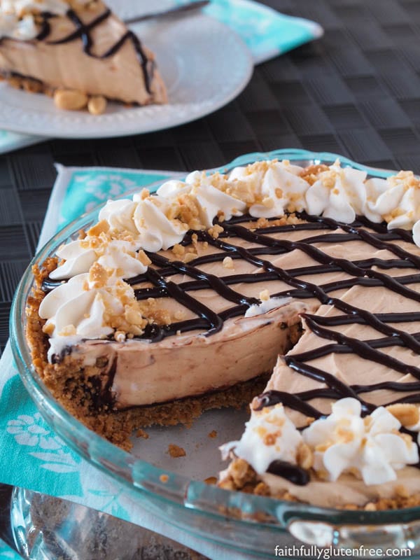 A tall glass of milk or a strong cup of coffee is all that you need to accompany this easy no bake Peanut Butter Pie with Chocolate Covered Pretzel Crust.