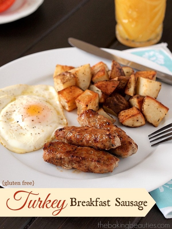 A plate of breakfast food, turkey sausage, fried eggs and hashbrowns