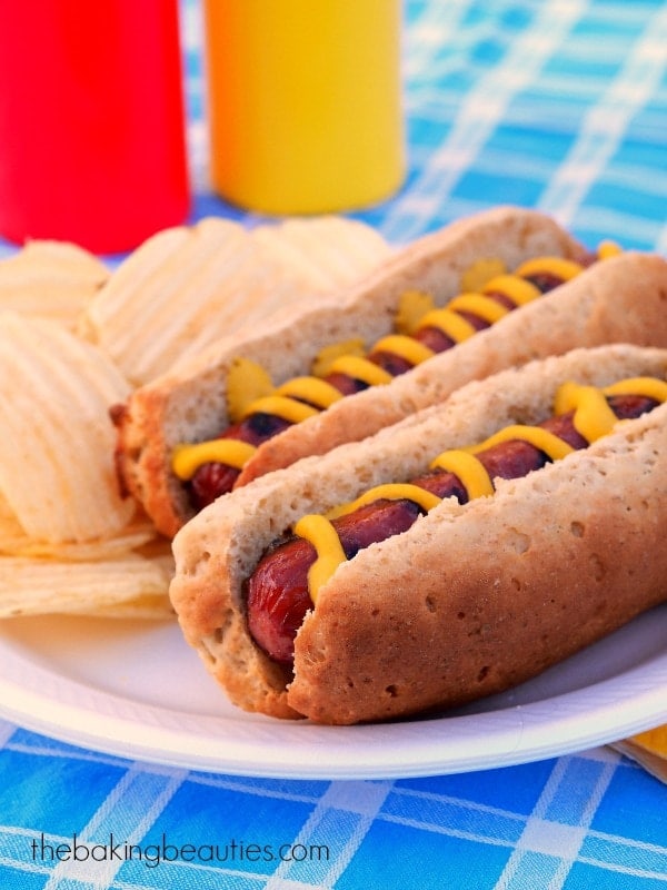 a plate with Gluten Free Hot Dogs and chips