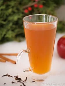 A tall mug of warm Spiced Apple Cider