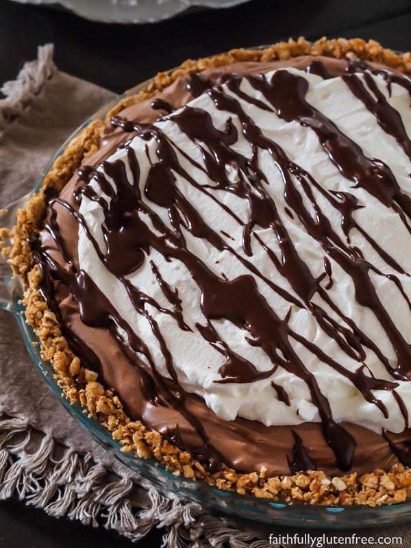 A No Bake Gluten Free Chocolate Cream Pie made with a pretzel crust