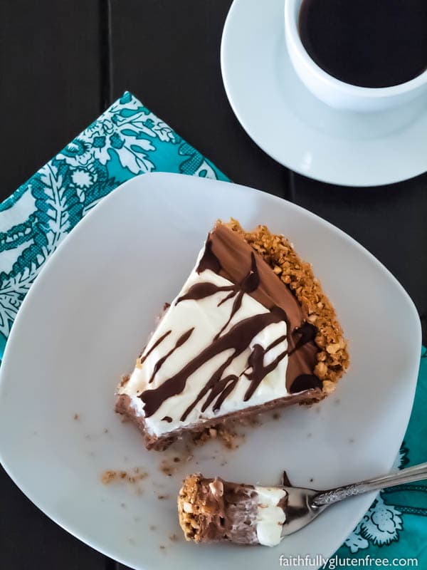 A slice of No Bake Gluten Free Chocolate Cream Pie made with a pretzel crust