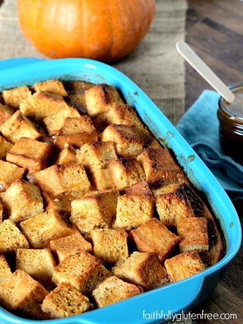 Embrace fall with a bowl of warm Gluten Free Pumpkin Bread Pudding drizzled with caramel sauce from Faithfully Gluten Free