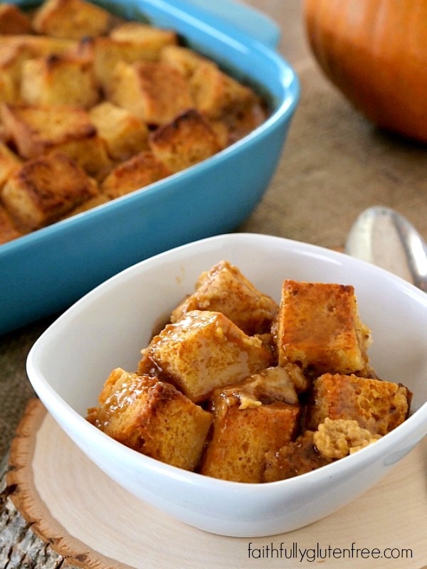 Embrace fall with a bowl of warm Gluten Free Pumpkin Bread Pudding drizzled with caramel sauce from Faithfully Gluten Free.