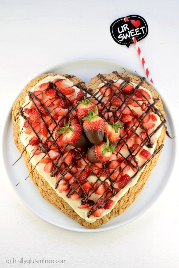 What a cute dessert for Valentine's Day! Gluten Free Chocolate Chip Cookie Pizza from Faithfully Gluten Free