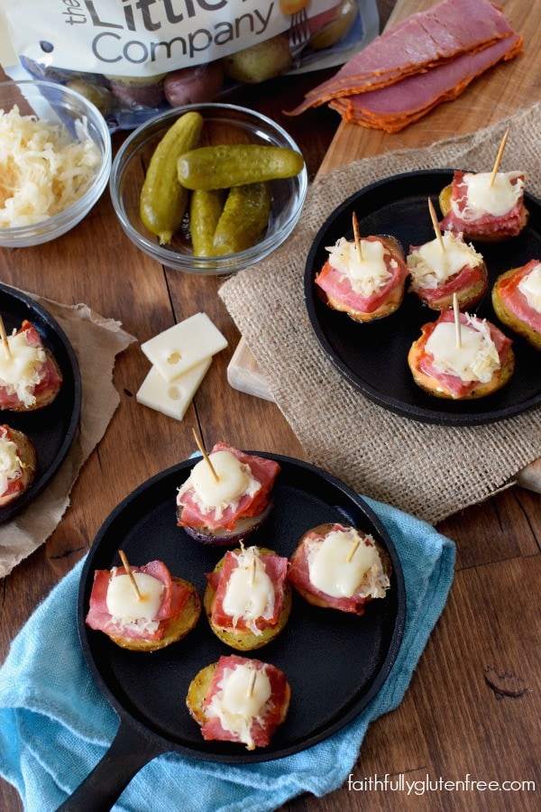 Potato Reuben Stacks - corned beef, saurkraut, dressing & Swiss cheese on a seasoned, roasted Creamer potato from Faithfully Gluten Free