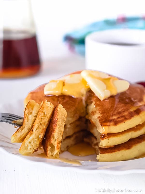 A cut stack of gluten free pancakes