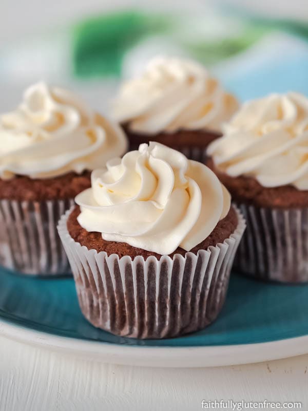 These Gluten Free Carrot Cake Cupcakes are loaded with shredded carrots and warming cinnamon. Topped with the lightest cream cheese frosting, you are going to love them!