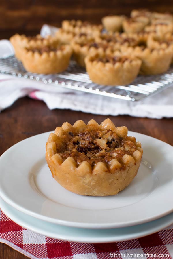 These decadent Gluten Free Maple Butter Tarts, with their crisp, buttery shell and gooey centers, are a true Canadian treasure.