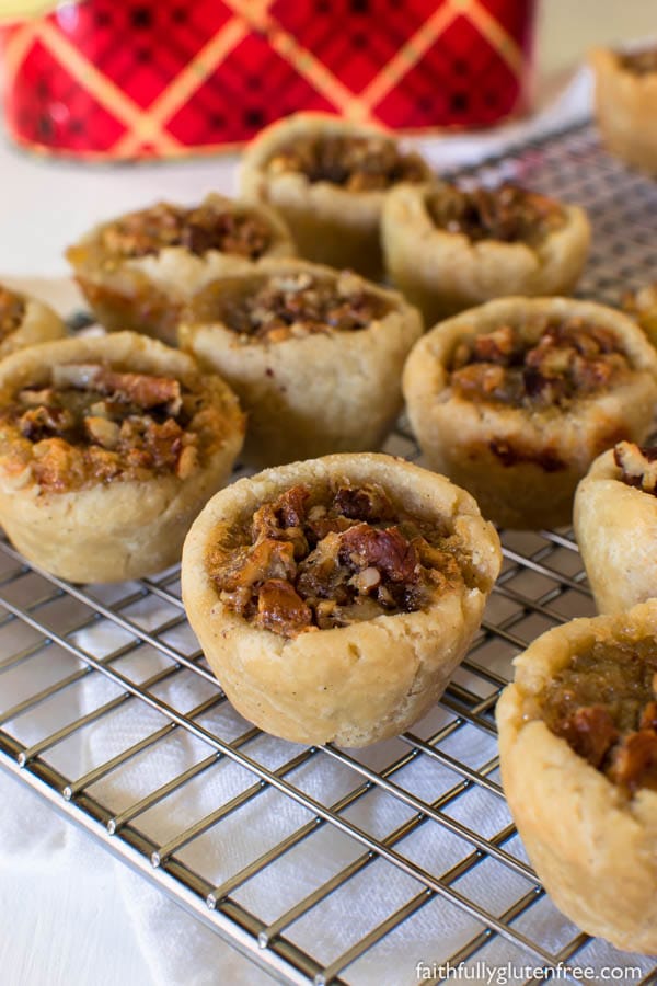 These decadent Gluten Free Maple Butter Tarts, with their crisp, buttery shell and gooey centers, are a true Canadian treasure.