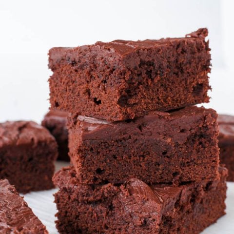 Gluten Free Lunch Lady Brownies are the perfect combination of cakey and fudgy brownies, and the frosting is out of the is world. Being the Lunch Lady can't have been a bad gig when you were serving up these treats.