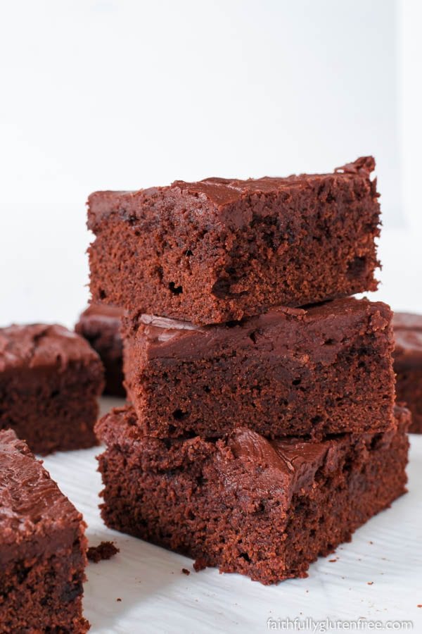 Gluten Free Lunch Lady Brownies are the perfect combination of cakey and fudgy brownies, and the frosting is out of the is world. Being the Lunch Lady can't have been a bad gig when you were serving up these treats.