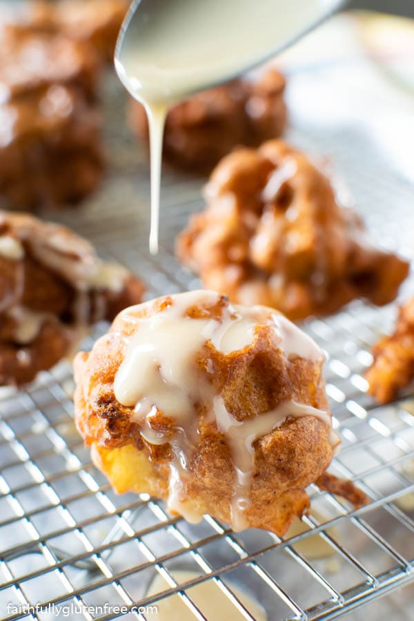 Apple Fritter being drizzled with glaze