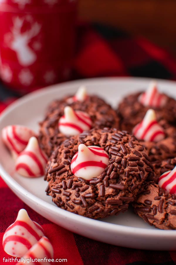Chocolate cookies topped with candy cane kisses