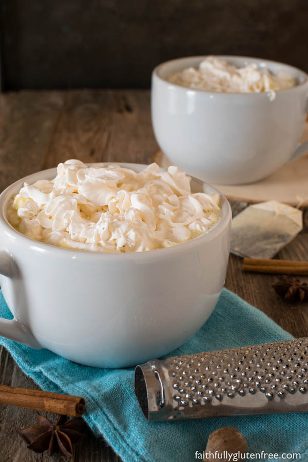 Large mugs of hot chocolate topped with whipped cream