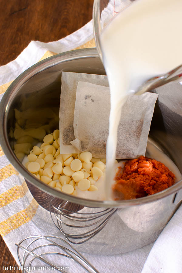 a pot with ingredients for a white chocolate pumpkin latte